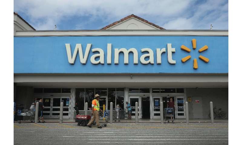 Walmart says it will pay $300 bonuses to full-time employees and $150 to those part-time to reward them 'for their hard work and