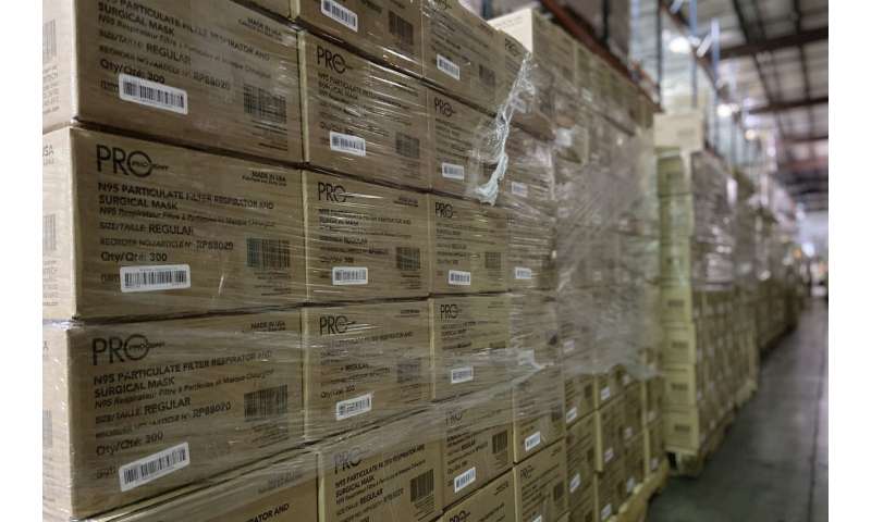 Hospitals still ration medical N95 masks as stockpiles swell