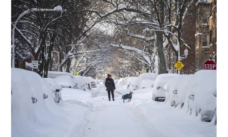 Millions endure record cold without power; at least 14 dead