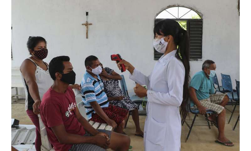 Brazil's pandemic deaths top 200,000 amid a return to fun