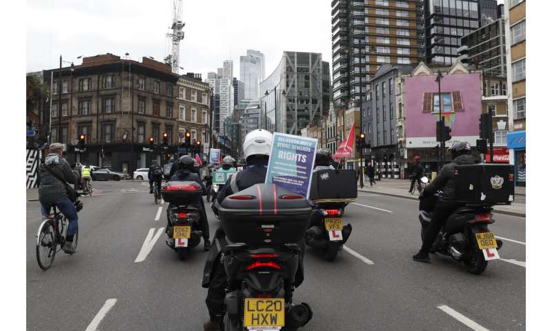 UK Deliveroo riders strike over pay, gig work conditions
