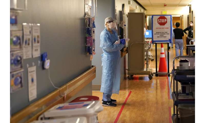 US virus deaths surpass 450K; daily toll is stubbornly high