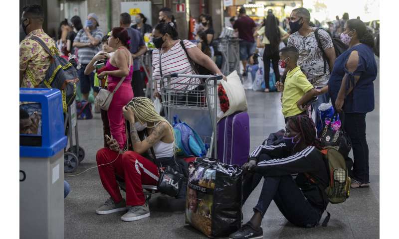 Brazil's pandemic deaths top 200,000 amid a return to fun