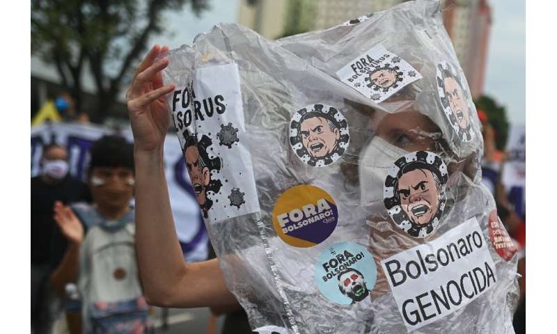 Protester protests Brazilian President Jair Bolsonaro's treatment of the Covid-19 pandemic in Rio de Janeiro
