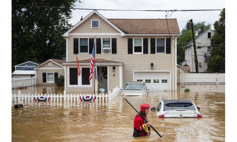 A flash flood caused by Tropical Storm Henri makes landfall, in Helmetta, New Jersey in August 2021