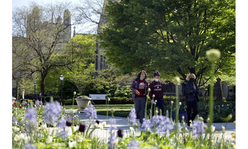 As US reopens, campuses tighten restrictions for virus