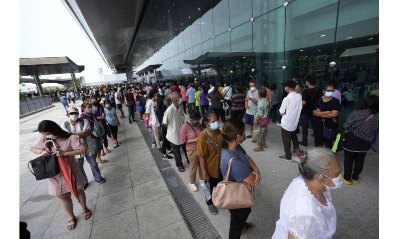Bangkok closes public spaces as virus surges in Thailand