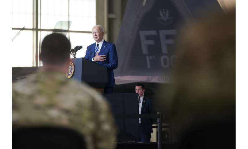 Biden marks vaccine progress, thanks troops ahead of holiday