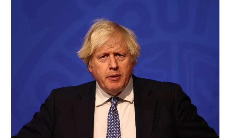 Britain's Prime Minister Boris Johnson Johnson announced the stringent measures while facing public anger over video footage of 