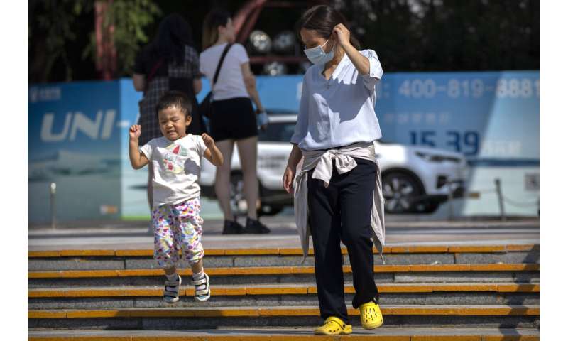 China allows couples third child amid demographic crisis