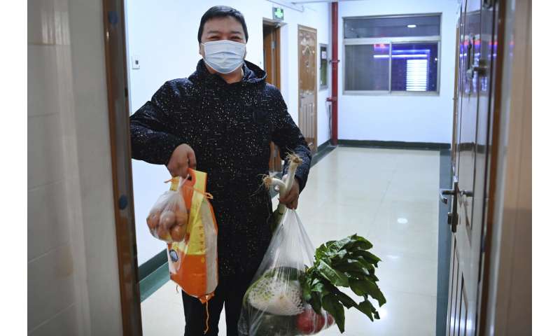 Chinese officials promise groceries for lockdown residents