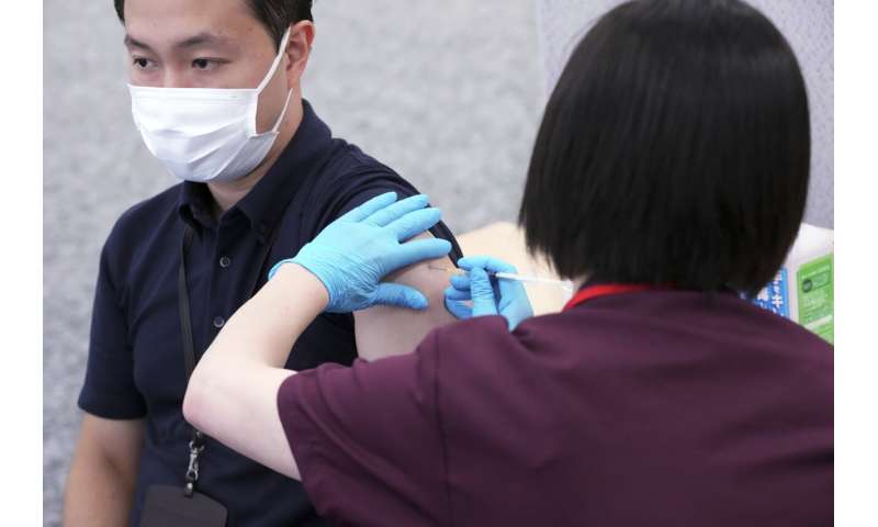 Companies give vaccines to workers, boosting Japan's rollout