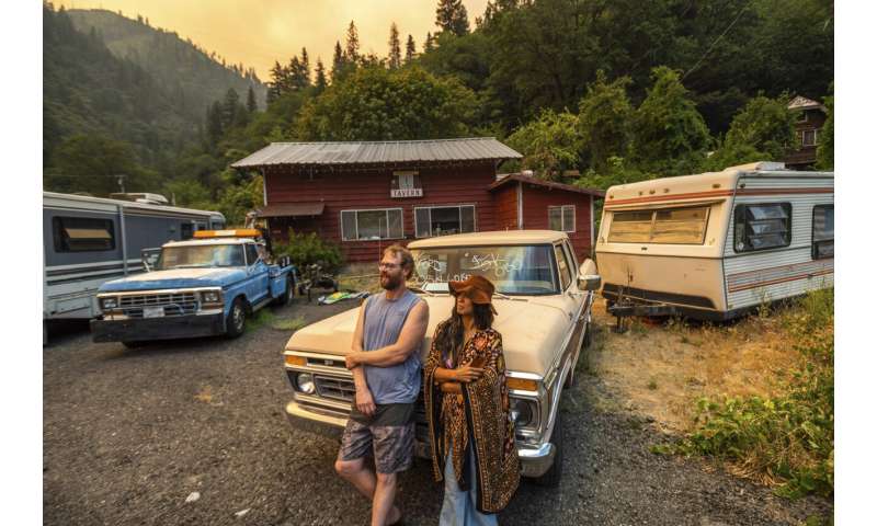 Erratic Oregon wildfire destroys dozens of homes, expands