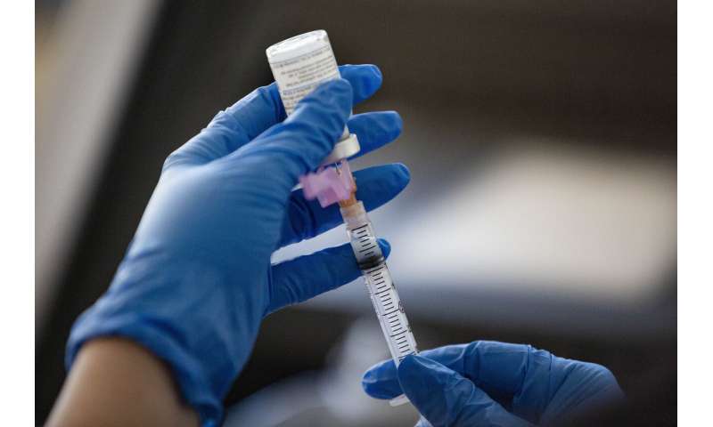 EXPLAINER: US regulator weighs in on vaccine dosing debate