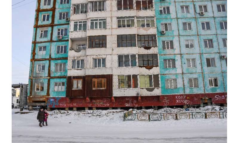 In Siberian cities, buildings have begun to crack as the ground shifts