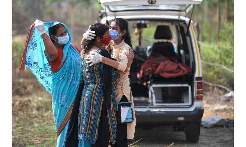 Indians are grieving in mass numbers as their country is hit with one of the world's worst pandemic waves