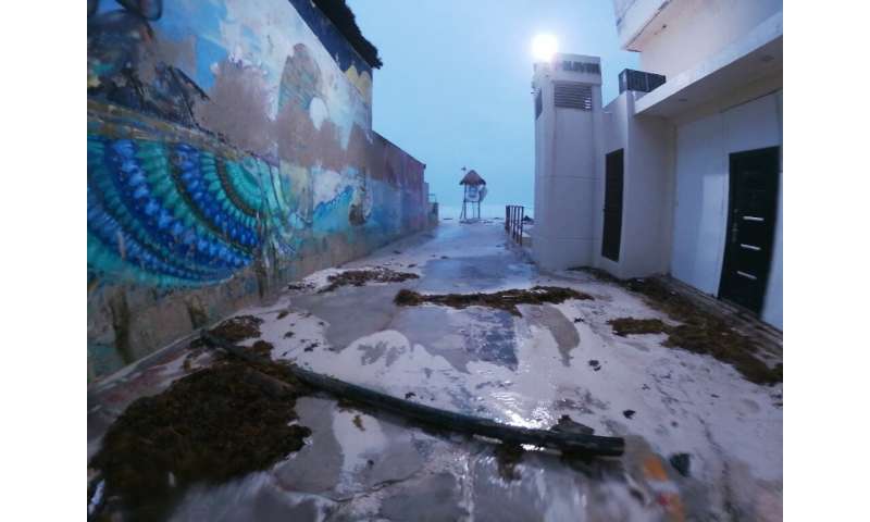 Strong winds and rain damaged beach structures in the resort city of Cancun
