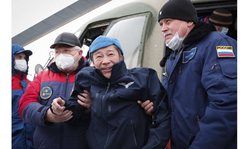 Japanese space tourists safely return to Earth