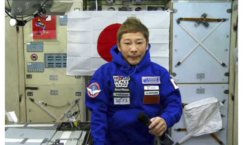 Japanese space tourist says he would love longer flight