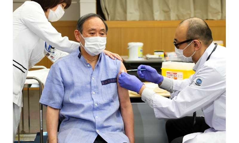 Japan's Prime Minister Yoshihide Suga received his vaccine on Tuesday