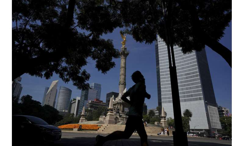 Mexico City lowers pandemic alert to lowest level