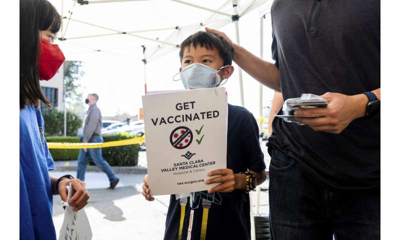 More vaccines, fewer mask rules as US keeps fighting COVID