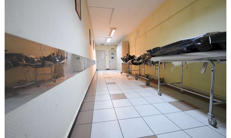 Morgues, hospitals struggle with COVID-19 deaths in Romania