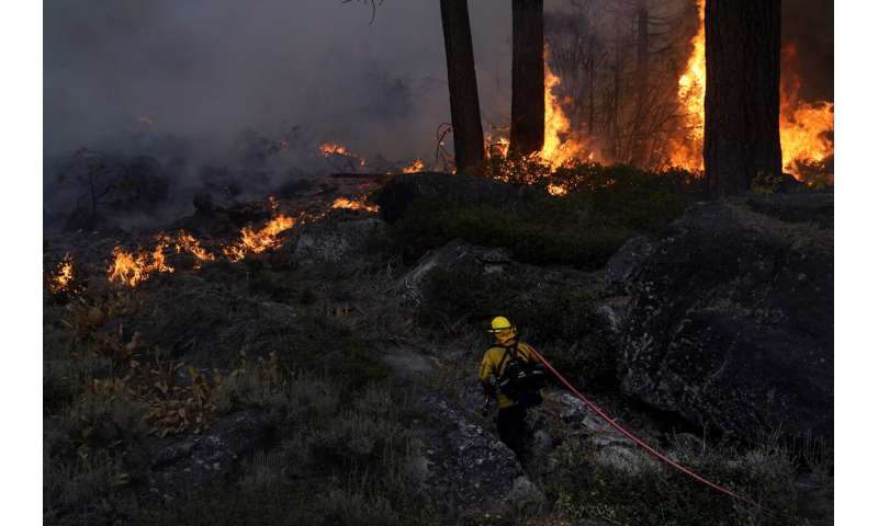 Official: Wildfire near Lake Tahoe largely kept from towns