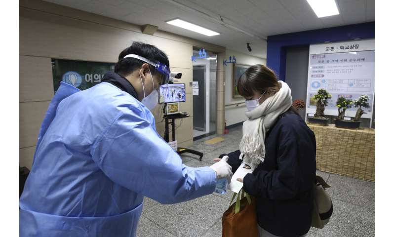 SKorea sees record virus jump as thousands take college exam