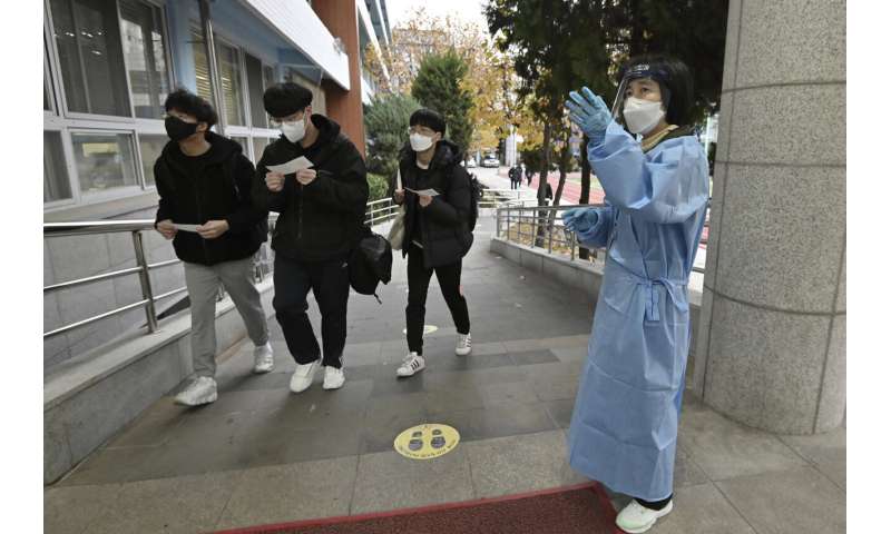 SKorea sees record virus jump as thousands take college exam