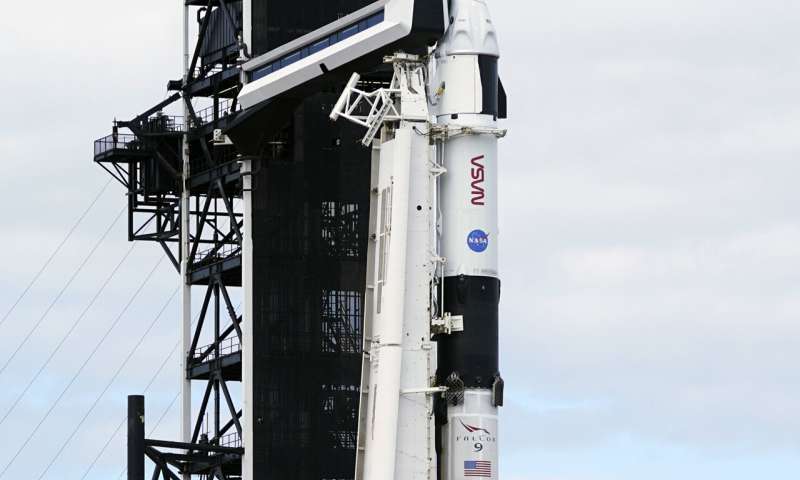 SpaceX aims for night crew launch; ailing astronaut now OK
