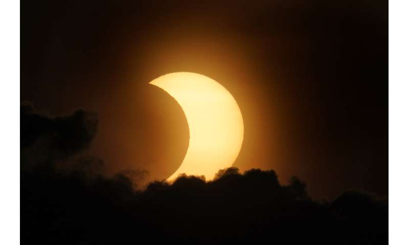 Sunrise special: Solar eclipse thrills world's northern tier