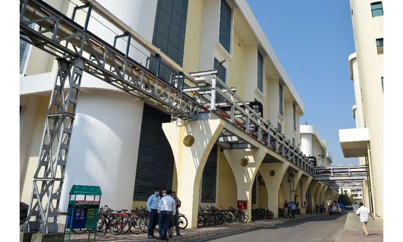 The palm-fringed Serum Institute campus in Pune is home to several buildings where vaccines are manufactured