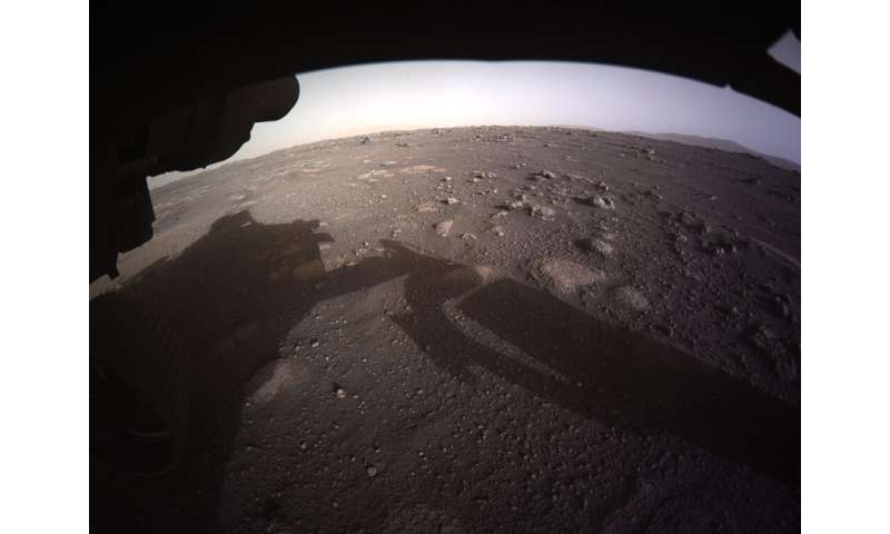 This NASA handout photo shows an image from NASA's Perseverance rover after it landed on the surface of Mars