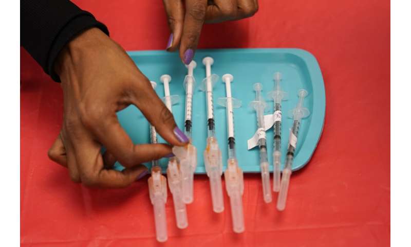 US has enough COVID-19 vaccines for boosters, kids' shots
