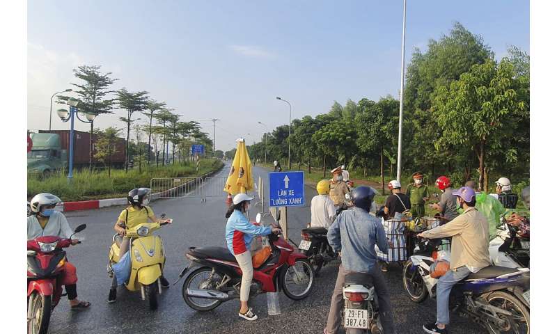 Vietnam locks down capital Hanoi for 15 days as cases rise