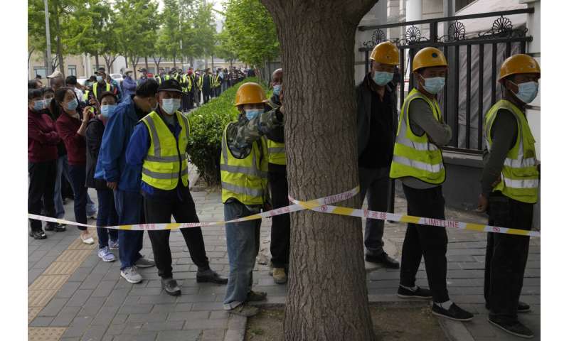 Beijing districts placed under lockdown as cases mount