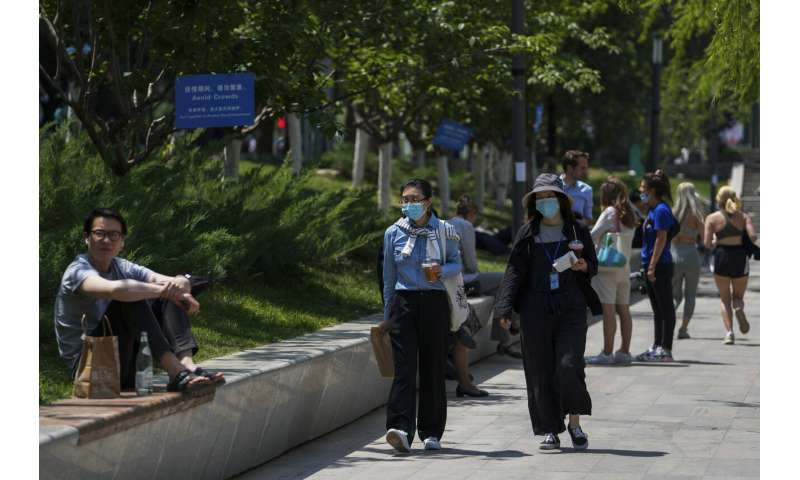 Beijing locks down more people in China's 'zero-COVID' fight