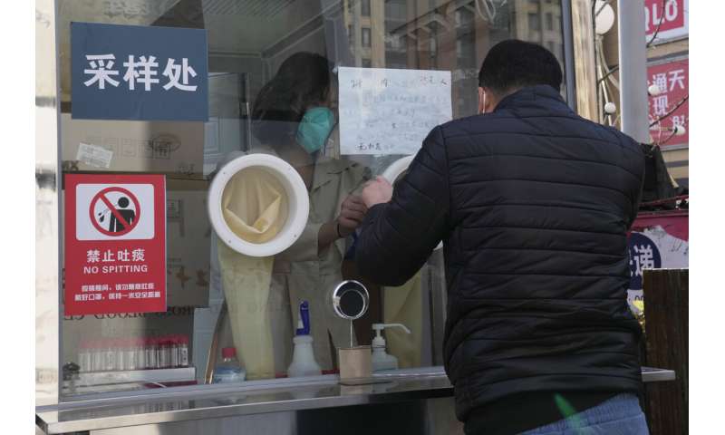 China cites coronavirus on packaging, despite doubts abroad