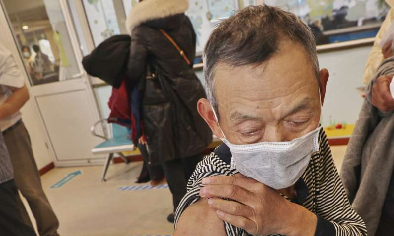 China races to vaccinate elderly, but many are reluctant
