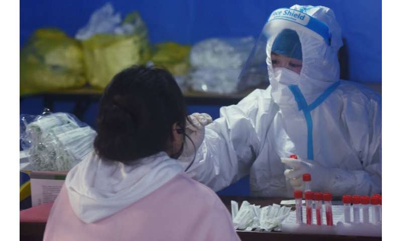 China reported 2,300 new virus cases nationwide on Monday and almost 3,400 a day earlier, the highest daily figure in two years