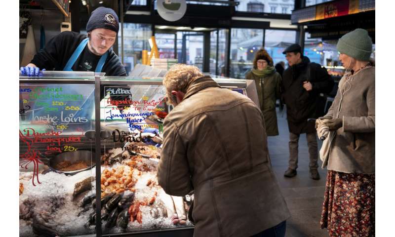 Danes halt virus restrictions; rest of Europe a patchwork