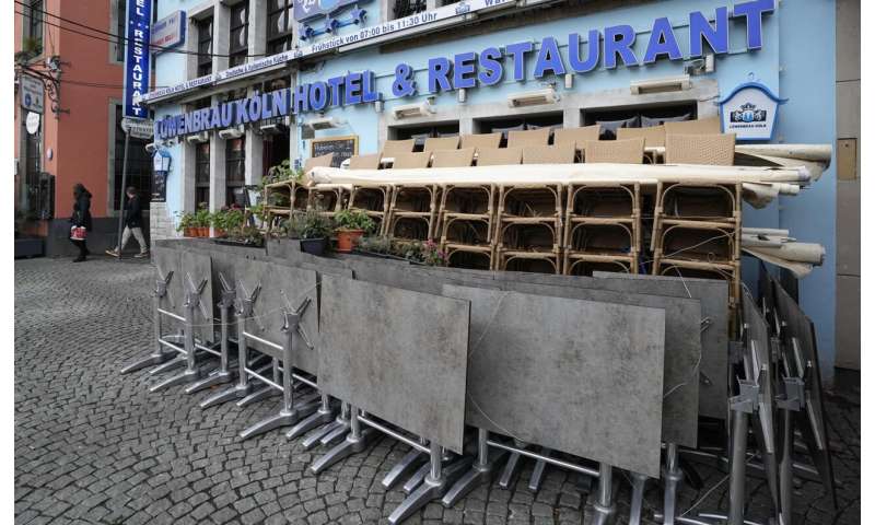 Germany to toughen restaurant rules, cut COVID quarantine