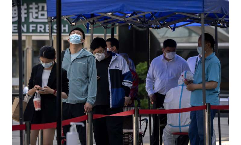 Hong Kong reopens beach, Beijing relaxes quarantine rules