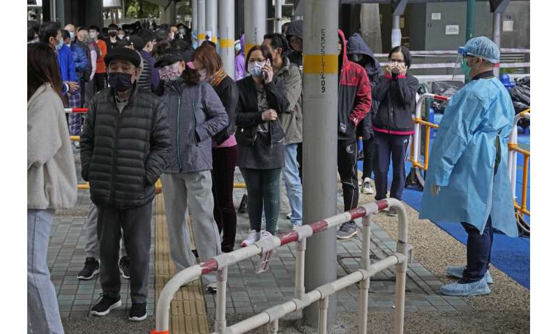 Hong Kong virus cluster in housing prompts partial lockdown