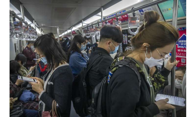 Shanghai eases 2-week shutdown, letting some residents out