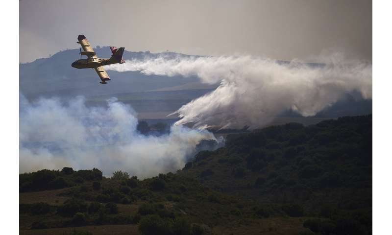 Spain, Germany battle wildfires amid unusual heat wave