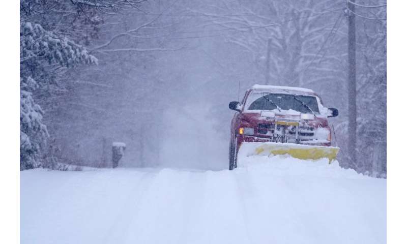 Winter storm snarls travel, gives some schools the day off
