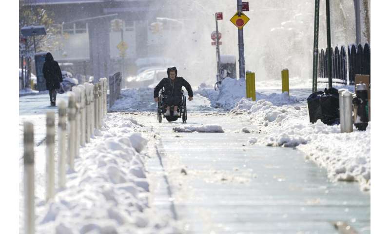 Winter storm snarls travel, gives some schools the day off