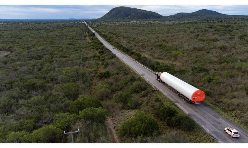 A truck transports parts of a wind turbine on the way to the Canudos Wind Energy Complex in Canudos, Bahia state, Brazil, on May